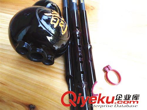 樂(lè)器類 廠家供應(yīng)棗色仿紅木葫蘆絲，精品雙音葫蘆絲，gd葫蘆絲，刻韻字原始圖片3